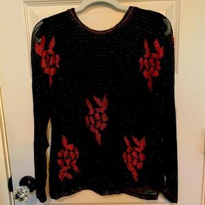 Hand beaded evening blouse. Incredible beadwork. Nice weight to this piece.